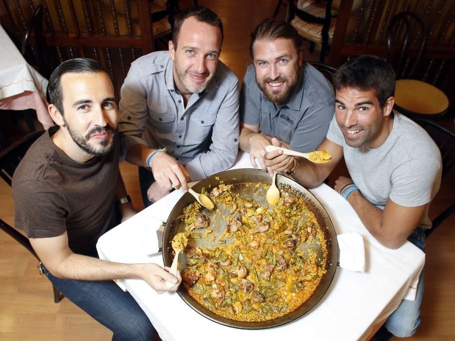 Spanish friends enjoy a delicious Paella