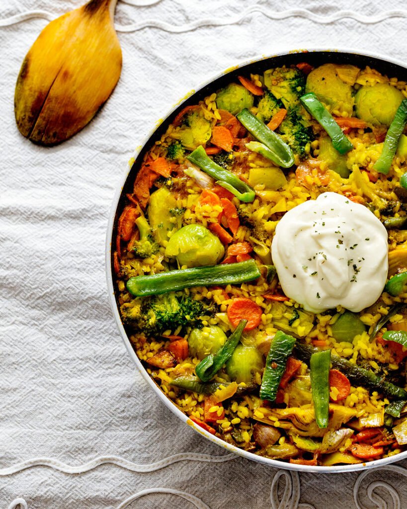 A delicious vegetable Paella with some Alioli on top