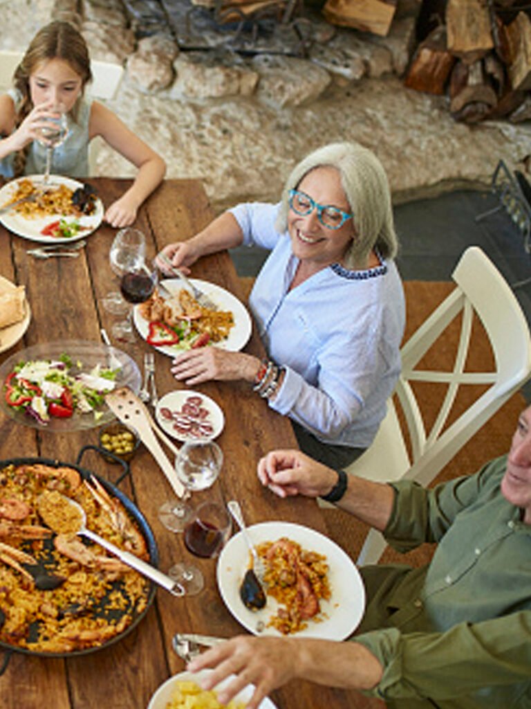 Spanish Family enjoying Paella